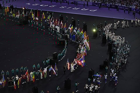 Flag bearers parade during the 2024 Summer Olympics closing ceremony